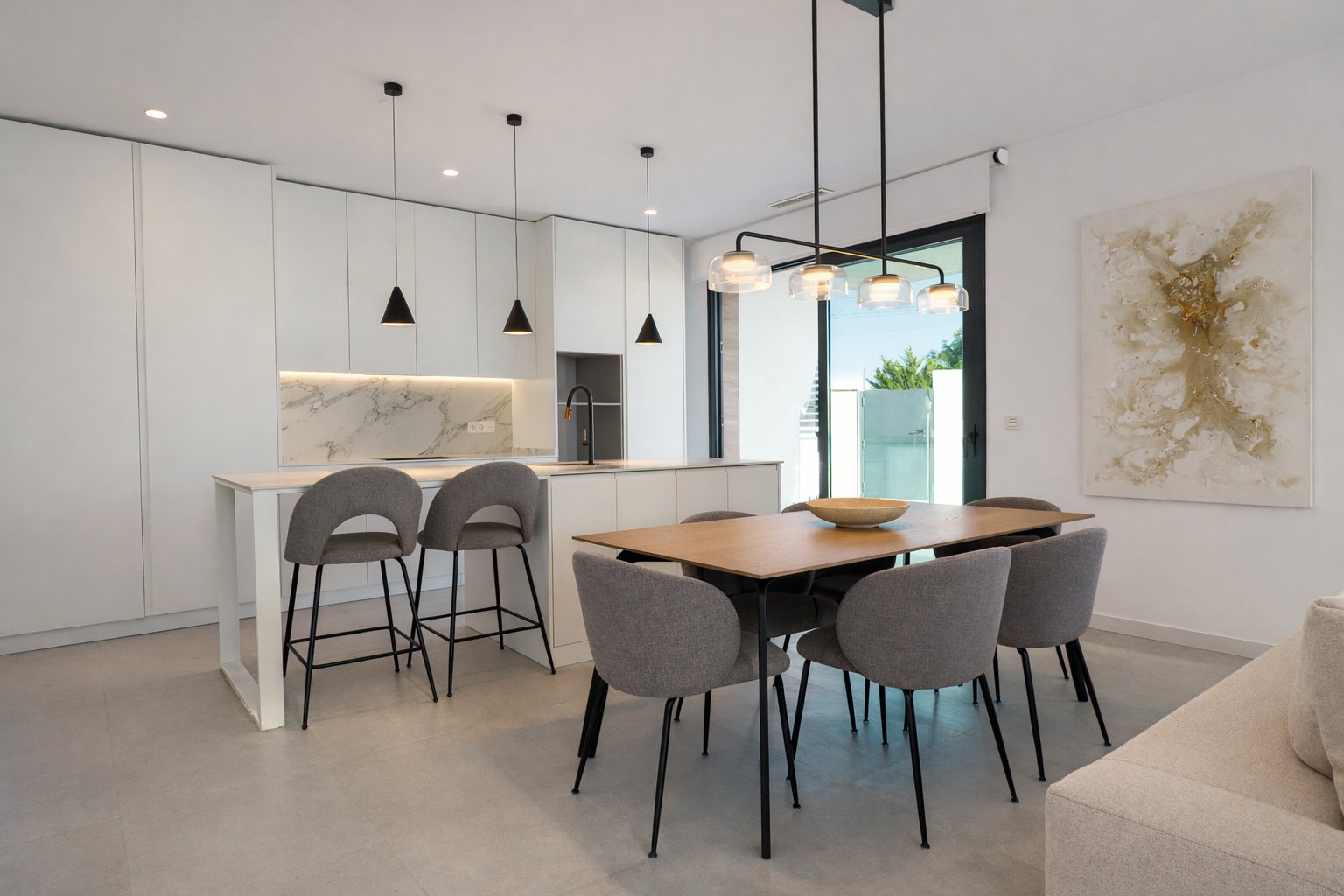 Salón y cocina de vivienda fotografiada profesionalmente